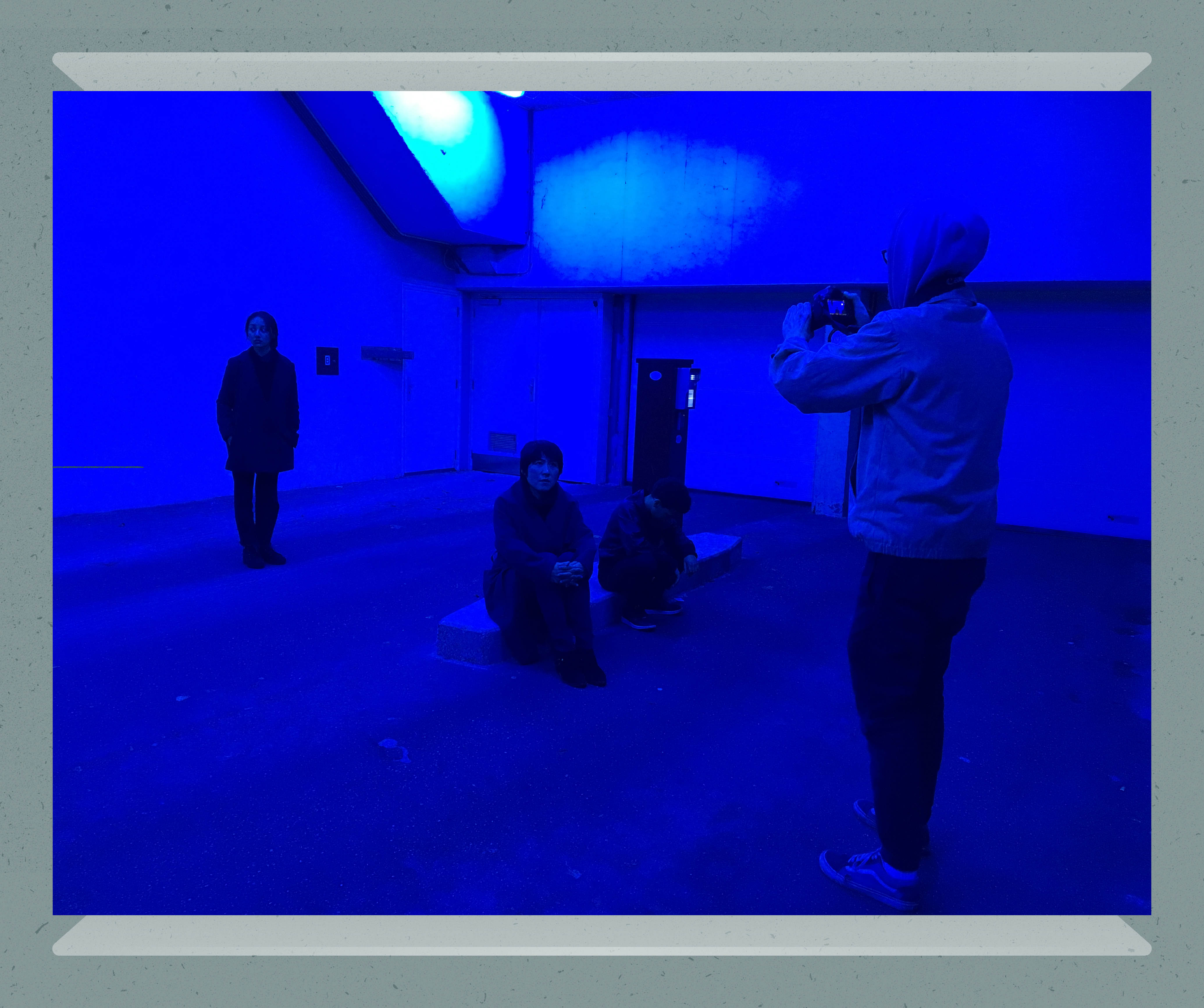 A behind-the-scenes of shooting the film in a location using only blue light